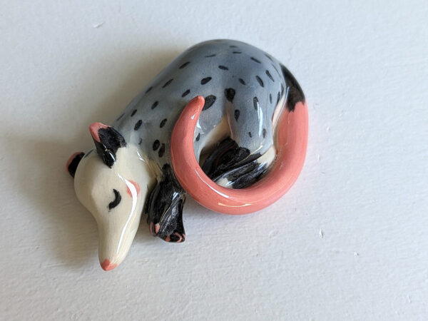 porcelain figurine handmade sleeping opossum kness