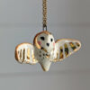 cute handmade porcelain barn owl pendant with wings out and gold