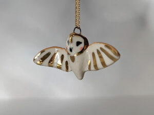 cute handmade porcelain barn owl pendant with wings out and gold