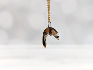 Porcelain ferret pendant