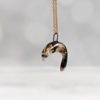 Porcelain ferret pendant