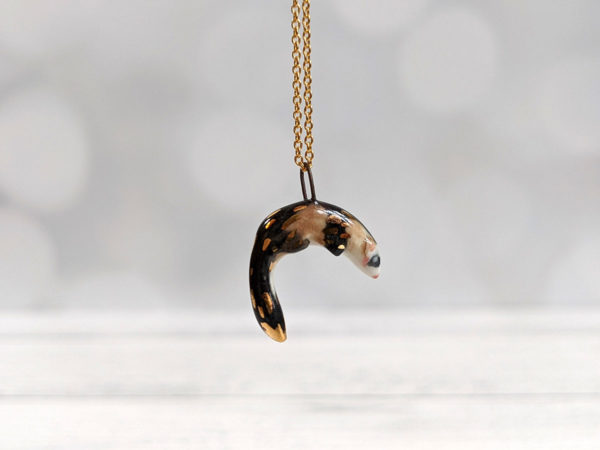 Porcelain ferret pendant