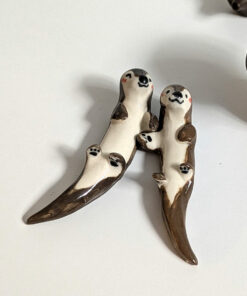 figurines couple otters