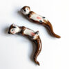figurines couple otters