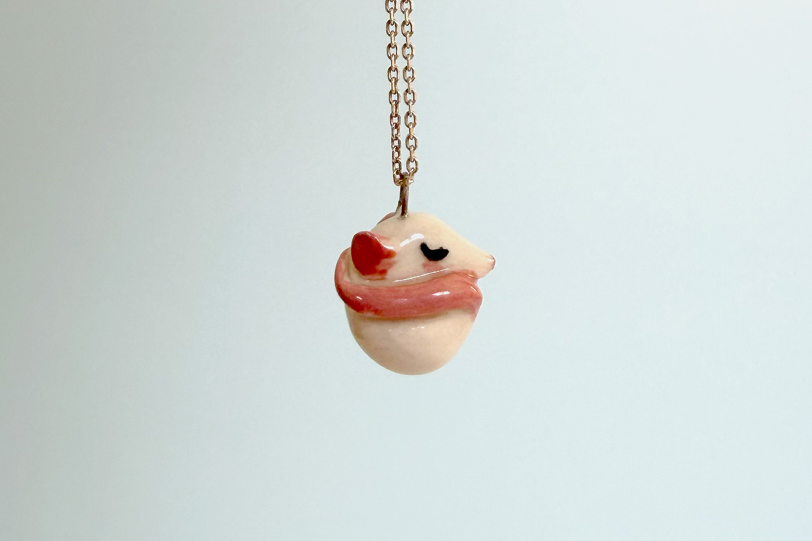 porcelain pendant rat