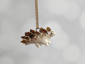 stegosaurus pendant cute porcelain jewelry by kness