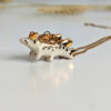 stegosaurus pendant cute porcelain jewelry by kness