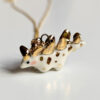 stegosaurus pendant cute porcelain jewelry by kness