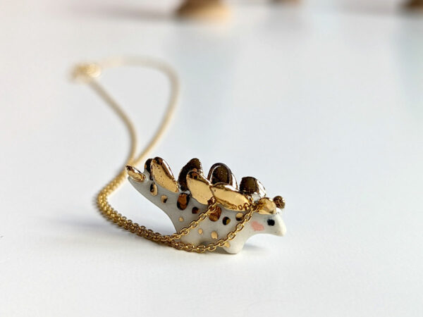 stegosaurus pendant cute porcelain jewelry by kness