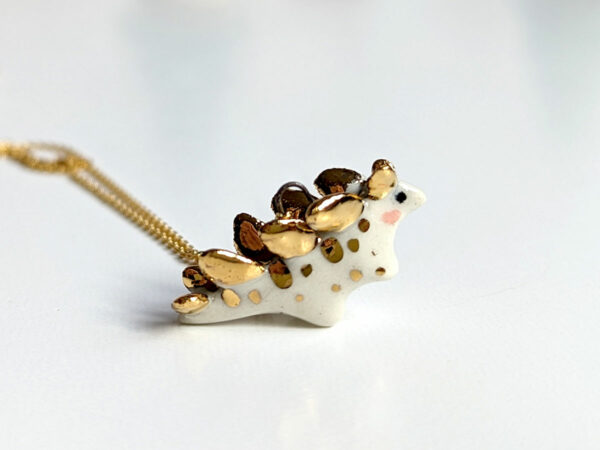 stegosaurus pendant cute porcelain jewelry by kness