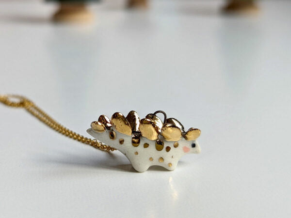 stegosaurus pendant cute porcelain jewelry by kness
