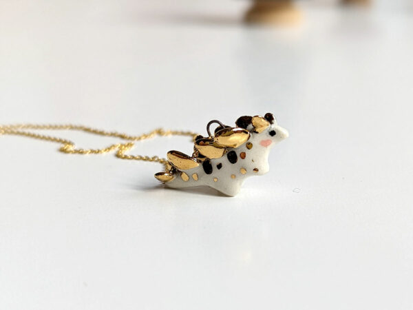 stegosaurus pendant cute porcelain jewelry by kness