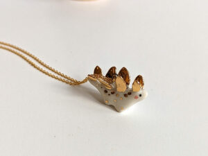 stegosaurus pendant cute porcelain jewelry by kness