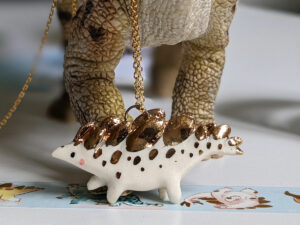 stegosaurus pendant porcelain and gold