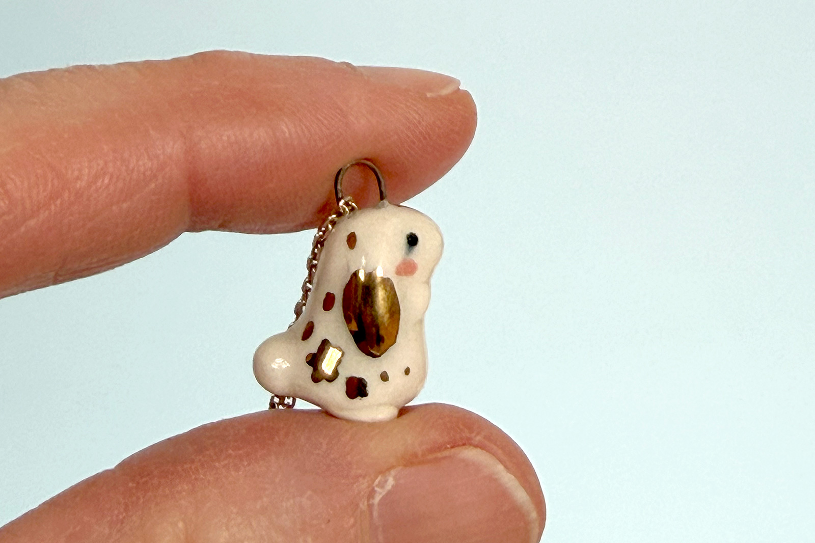 Pendentif lapin rond doré