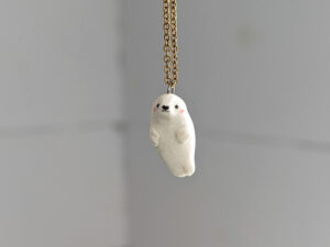 baby seal pendant in white porcelain