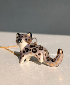 porcelain pendant snow leopard