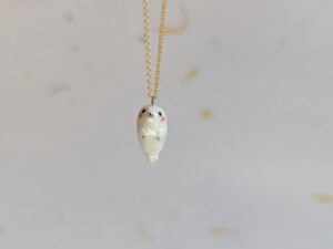 baby seal pendant in white porcelain