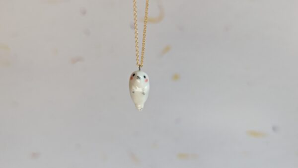 baby seal pendant in white porcelain