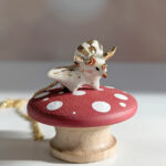 cute triceratops pendant handmade porcelain by kness