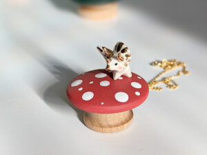 cute triceratops pendant handmade porcelain by kness