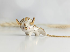 cute triceratops pendant handmade porcelain by kness