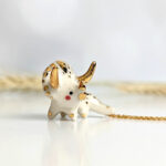 cute triceratops pendant handmade porcelain by kness