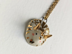 handmade porcelain cute triceratops pendant