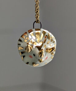 handmade porcelain cute triceratops pendant