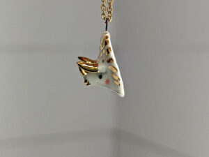 handmade porcelain cute triceratops pendant