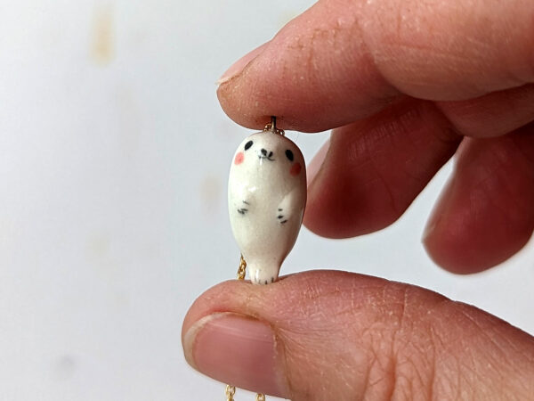 baby seal porcelain pendant