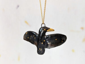 porcelain raven pendant