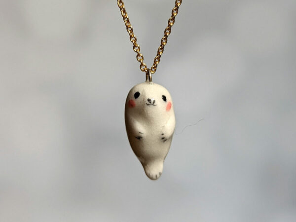 baby seal pendant in white porcelain