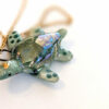 handmade porcelain turtle pendant