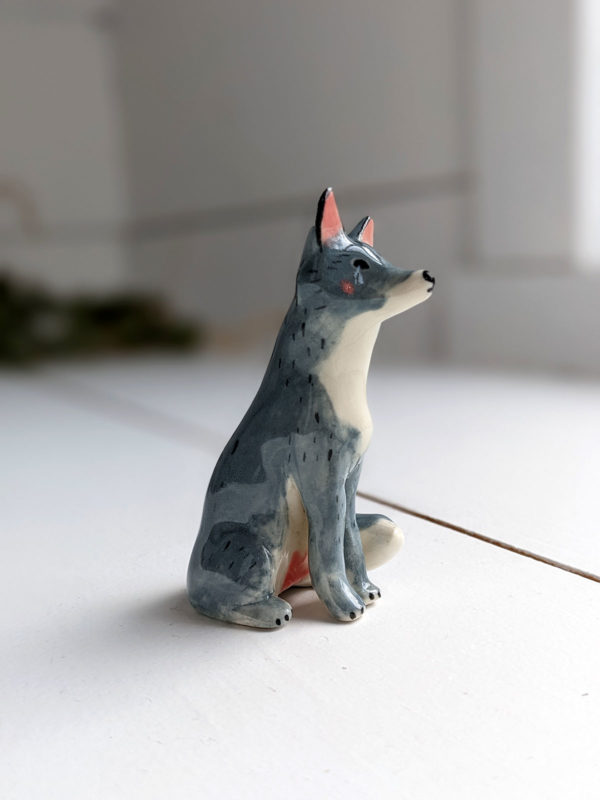 grey wolf figurine porcelain