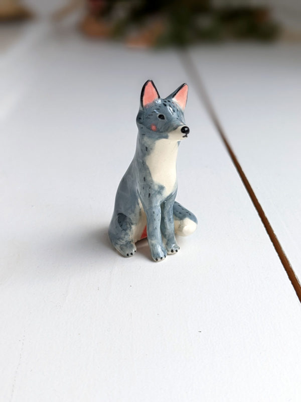 grey wolf figurine porcelain