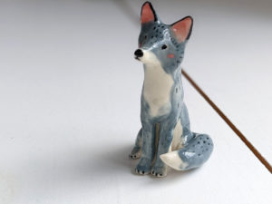 grey wolf figurine porcelain