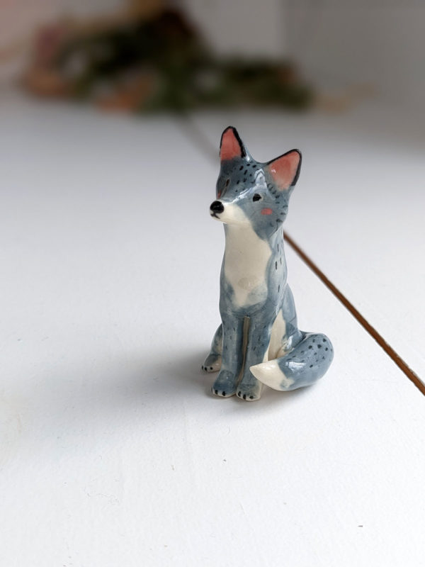 grey wolf figurine porcelain