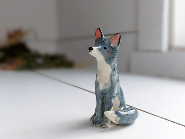 grey wolf figurine porcelain