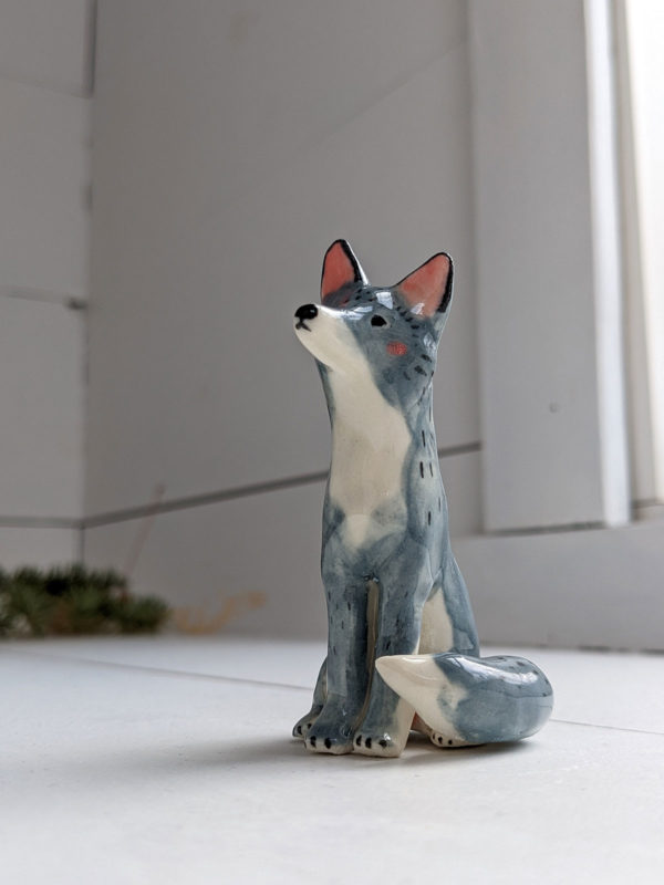 grey wolf figurine porcelain