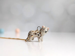 porcelain pendant snow leopard