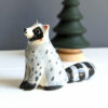 porcelain raccoon figurine cute