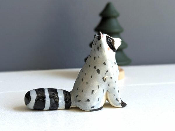 porcelain raccoon figurine cute