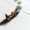 porcelain otter mom and baby figurine