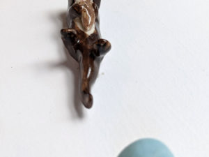 porcelain otter mom and baby figurine