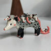 porcelain figurine opossum mama