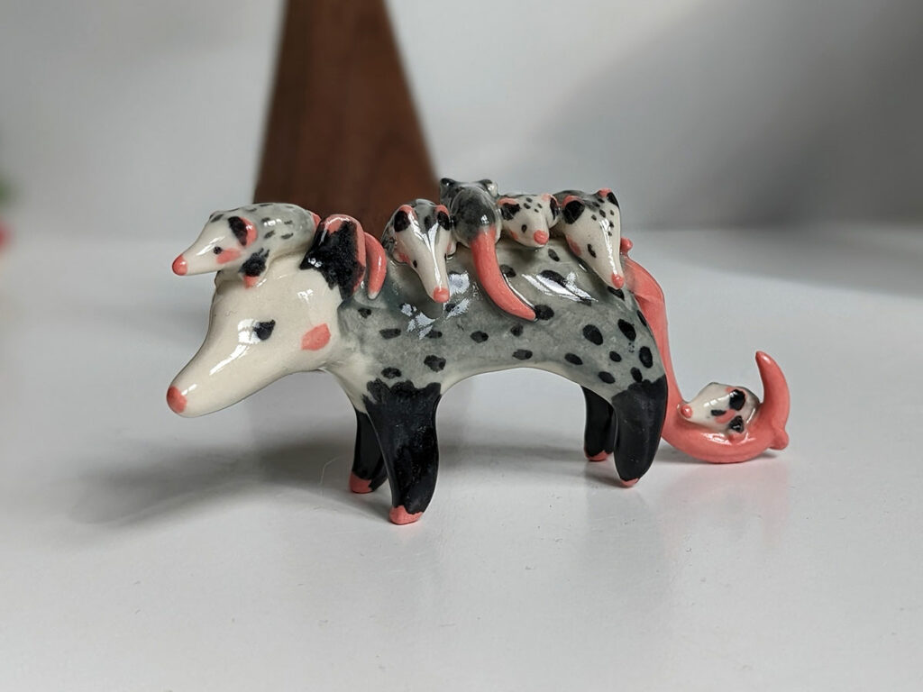 porcelain figurine opossum mama