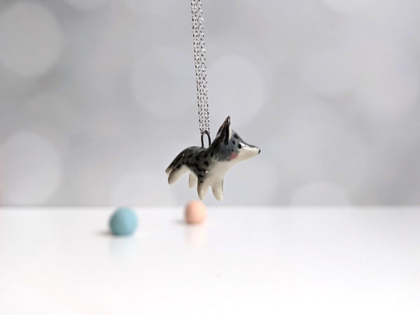 porcelain wolf pendant