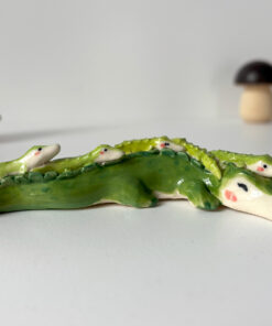 adorable figurine of a crocodile family