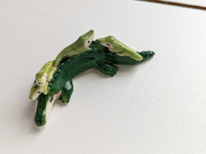 cute porcelain crocodile mama figurine and babies
